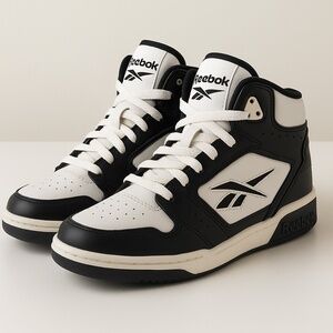 Unisex style. Reebok High Top basketball sneakers. size Womens 5 (kids 3.5-4)